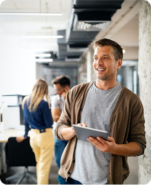 Business professionals discussing with clipboard